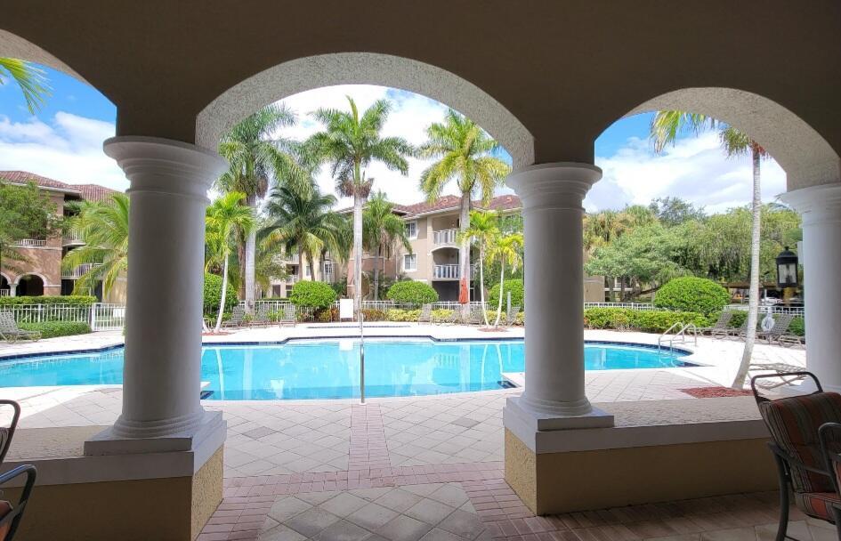 Photo of 6533 Emerald Dunes Drive #304, West Palm Beach, FL 33411 (MLS # R11059488)