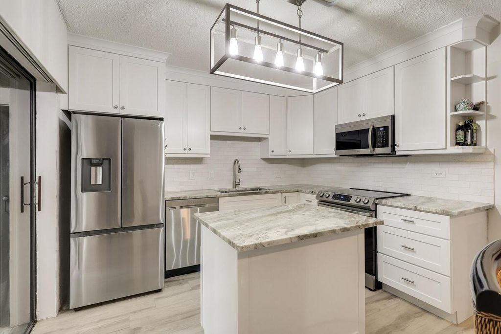 Photo of 408 4th Lane, Palm Beach Gardens, FL 33418 (MLS # R10950265)