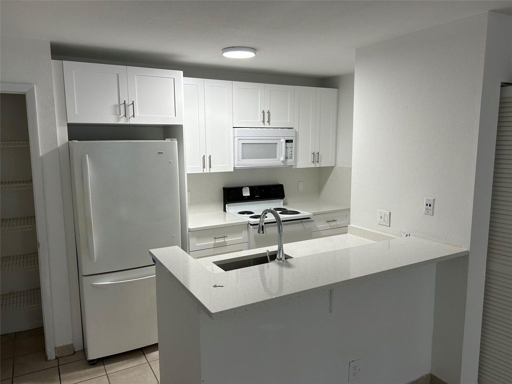 Photo of 1705 Palm Cove Boulevard #1-102, Delray Beach, FL 33435 (MLS # F10473271)