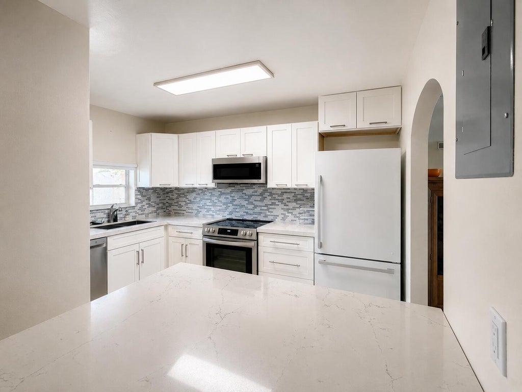 Photo of 9411 N Hollybrook Lake Drive #309, Pembroke Pines, FL 33025 (MLS # B26069109)