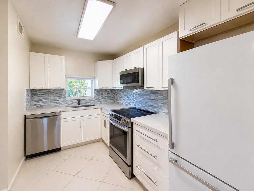 Photo of 9411 N Hollybrook Lake Drive #309, Pembroke Pines, FL 33025 (MLS # B26069109)