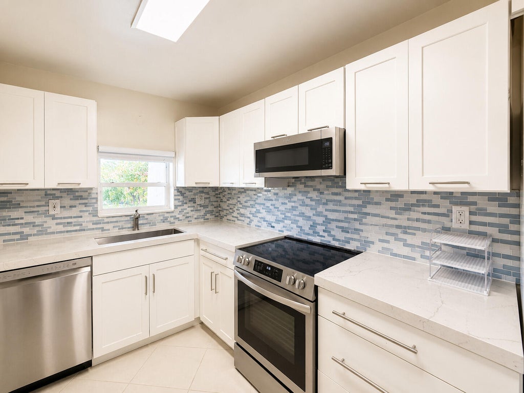 Photo of 9411 N Hollybrook Lake Drive #309, Pembroke Pines, FL 33025 (MLS # B26069109)