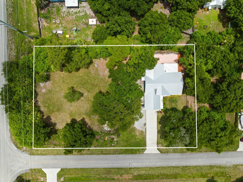 Photo of 8802 Coquina Avenue, Fort Pierce, FL 34951 (MLS # R10997550)