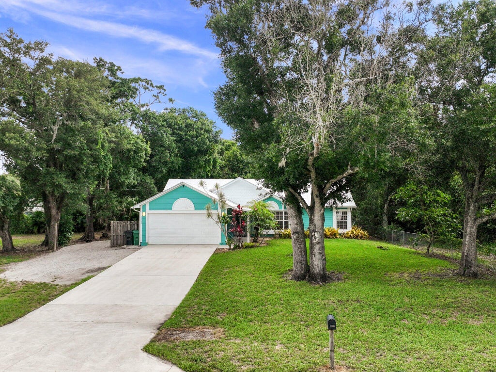 Photo of 8802 Coquina Avenue, Fort Pierce, FL 34951 (MLS # R10997550)