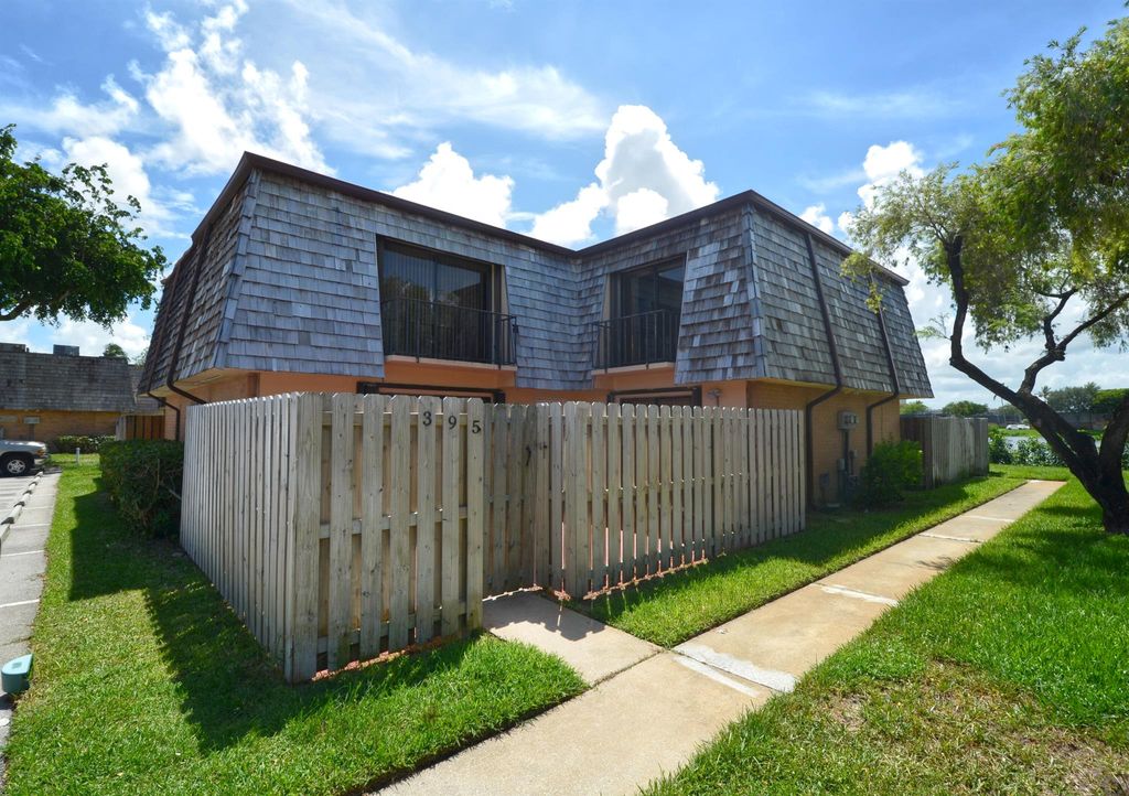 Photo of 395 Lake Arbor Drive, Palm Springs, FL 33461 (MLS # R10999564)