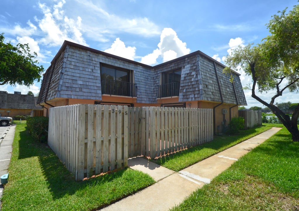 Photo of 395 Lake Arbor Drive, Palm Springs, FL 33461 (MLS # R10999564)