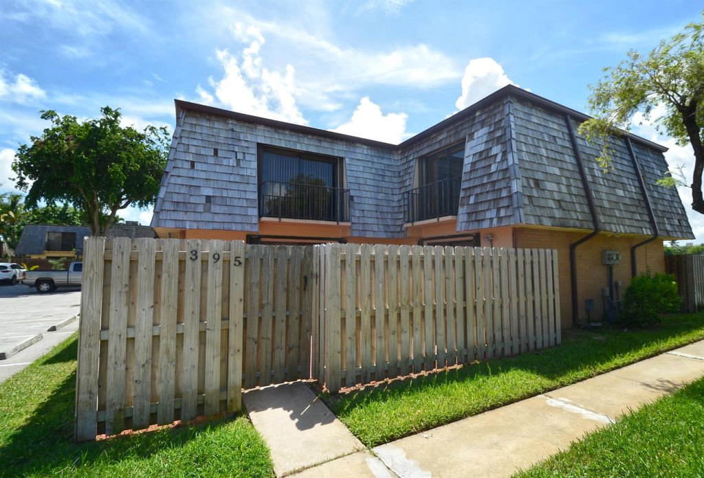 Photo of 395 Lake Arbor Drive, Palm Springs, FL 33461 (MLS # R10999564)