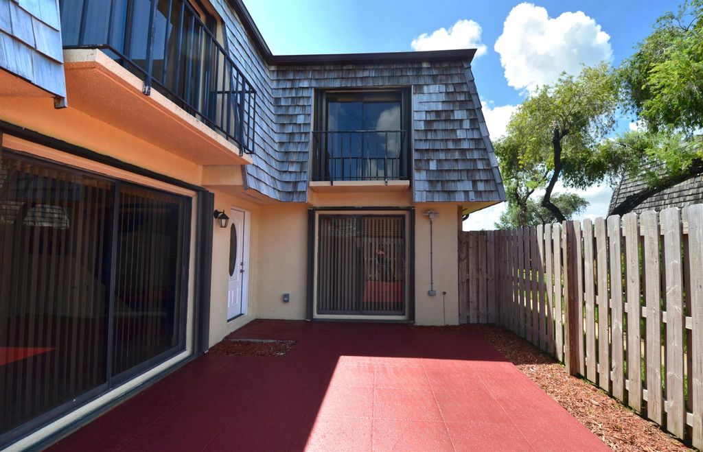 Photo of 395 Lake Arbor Drive, Palm Springs, FL 33461 (MLS # R10999564)