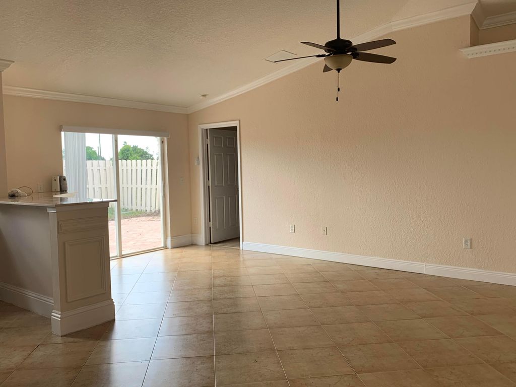 Photo of 5900 Azalea Circle, West Palm Beach, FL 33415 (MLS # R11166469)