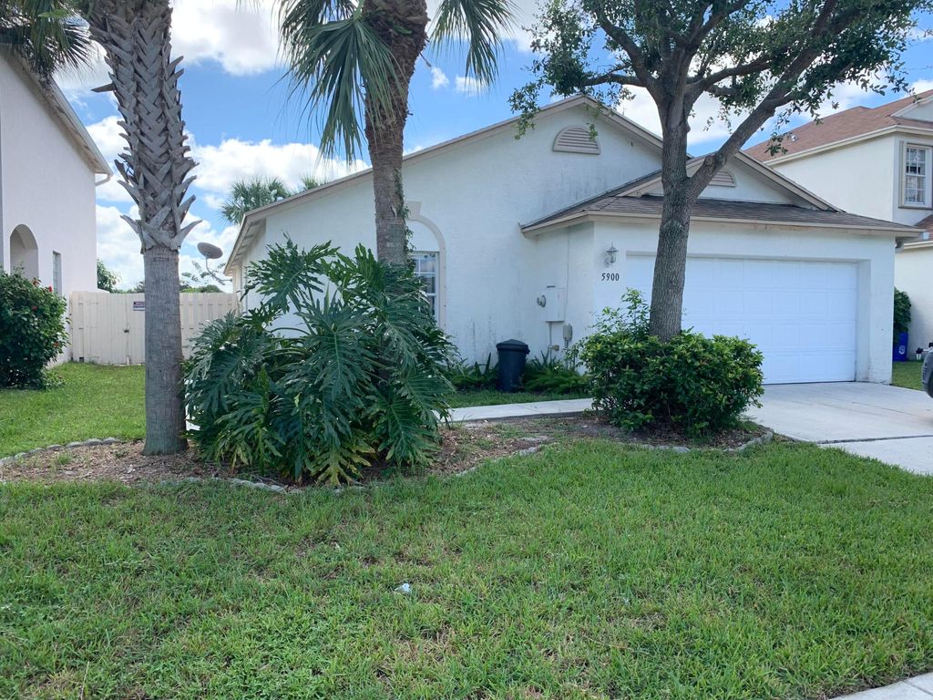 Photo of 5900 Azalea Circle, West Palm Beach, FL 33415 (MLS # R11166469)
