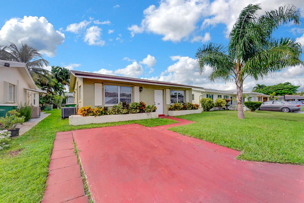 Photo of 4938 NW 54th Court, Tamarac, FL 33319 (MLS # B26086936)