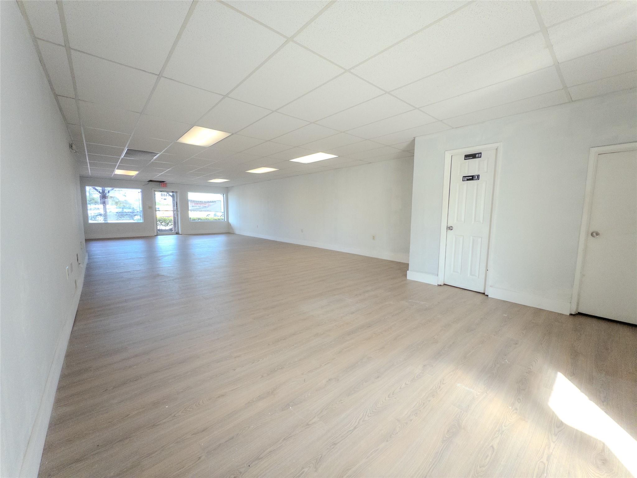 Prime 900 sq ft retail space for lease in the heart of Davie’s historic Western-themed downtown! Located on busy Davie Road with great visibility and high foot traffic. Freshly primed walls ready for your customization. Space features brand-new vinyl floors and one bathroom. Perfect for boutiques, coffee shops, salons, small eateries, galleries, or office/showroom use. Versatile layout makes it easy to customize for your vision. Positioned in a rapidly growing corridor with major new development plans that will bring even more residents, visitors, and energy to the area. Don’t miss this rare chance to plant your business in Davie’s future! Terms: Prefer a multi-year lease.
