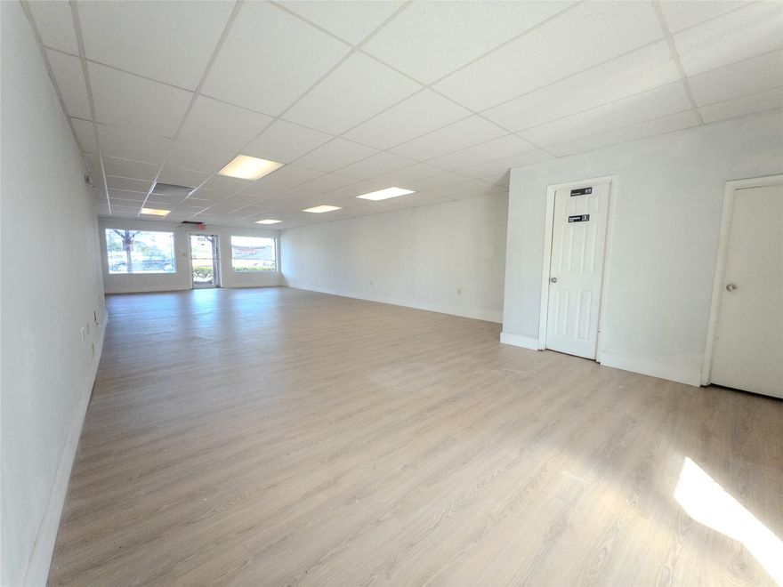 Prime 900 sq ft retail space for lease in the heart of Davie’s historic Western-themed downtown! Located on busy Davie Road with great visibility and high foot traffic. Freshly primed walls ready for your customization. Space features brand-new vinyl floors and one bathroom. Perfect for boutiques, coffee shops, salons, small eateries, galleries, or office/showroom use. Versatile layout makes it easy to customize for your vision. Positioned in a rapidly growing corridor with major new development plans that will bring even more residents, visitors, and energy to the area. Don’t miss this rare chance to plant your business in Davie’s future! Terms: Prefer a multi-year lease.