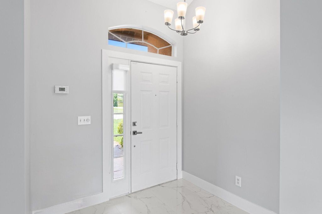 Photo of 2870 SE East Blackwell Drive, Port Saint Lucie, FL 34952 (MLS # R11001569)