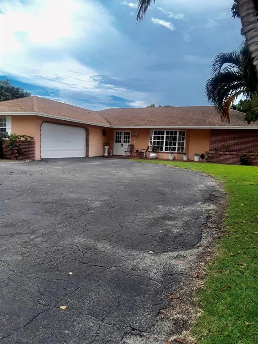 Photo of 152 Sandpiper Avenue, Royal Palm Beach, FL 33411 (MLS # R10755263)