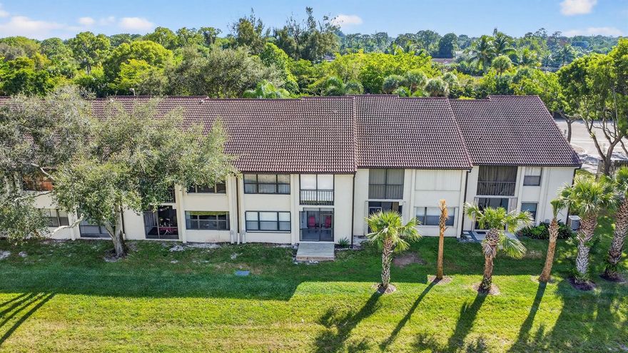 Spacious first floor apartment with water views from living area and master bedroom. This great apartment has a brand new a/c.  Master has sliding glass doors looking out to patio and waterway.  Large open living and dining area.  Lucerne Lakes has pools, tennis courts, clubhouse, library, plus close to Wellington Mall, multiple restaurants, movie theatre and more.  Turnpike is minutes away.