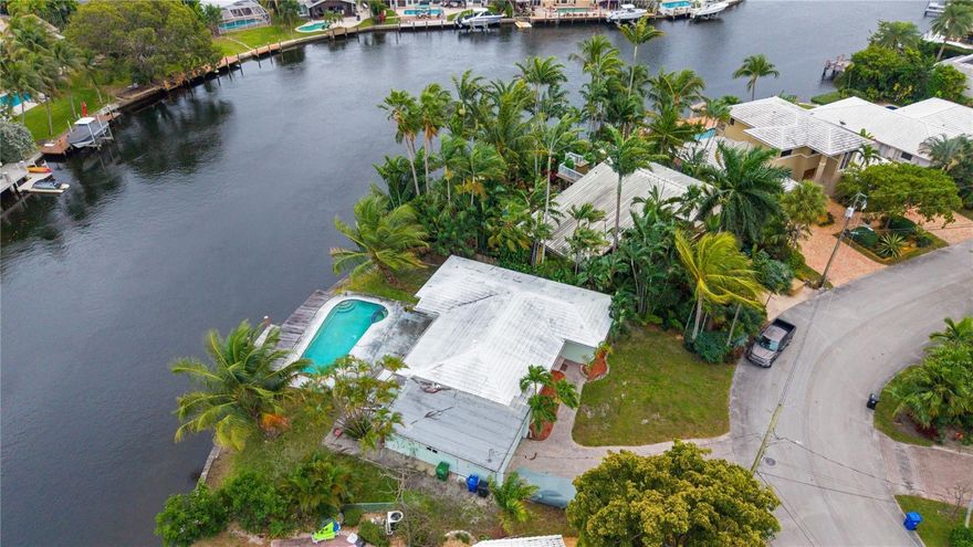 Look at this!!! Unbelievable!! You have  delightful BAL HARBOUR with 115 feet directly on the Middle River and beautiful southeast exposure with delightful breezes for your backyard pleasure. The house needs extensive updating, but with some work and imagination, you can have a great place to live in this outstanding neighborhood of Bal Harbour. The backyard on the River is curved, which gives you great privacy with lovely views watching the boats and kayakers drift by. This is very close to the end of the cul-de-sac so bare minimum of traffic on the street. Bal Harbour is a gated and "real" neighborhood which is close to grocery stores, small outdoor cafes and quiet atmosphere.