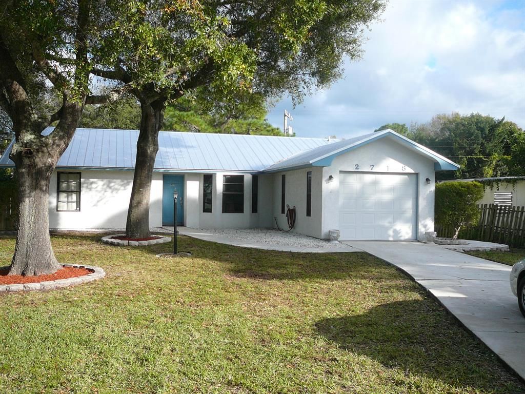 Photo of 2718 Sunrise Boulevard Blvd, Fort Pierce, FL 34982 (MLS # R10679500)