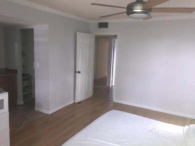 Photo of 9480 Poinciana Place #310, Davie, FL 33324 (MLS # B26061275)