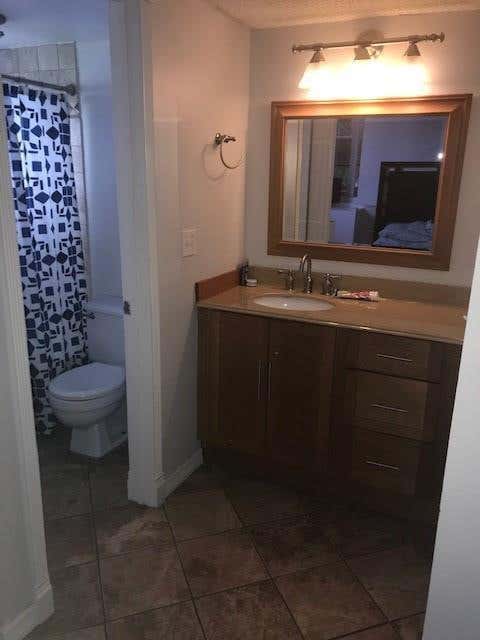 Photo of 9480 Poinciana Place #310, Davie, FL 33324 (MLS # B26061275)