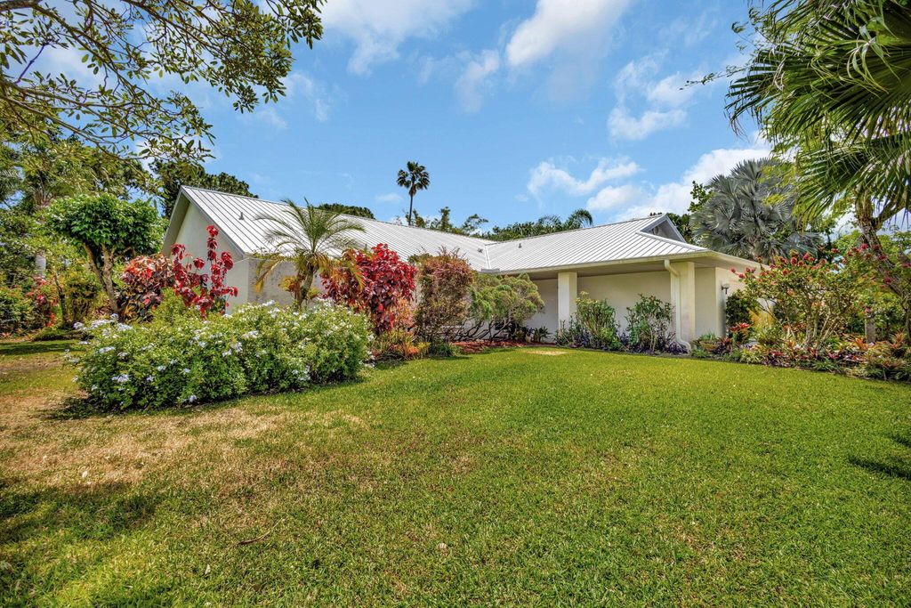 Photo of 2101 SE Harlow Street, Port Saint Lucie, FL 34952 (MLS # R11078427)