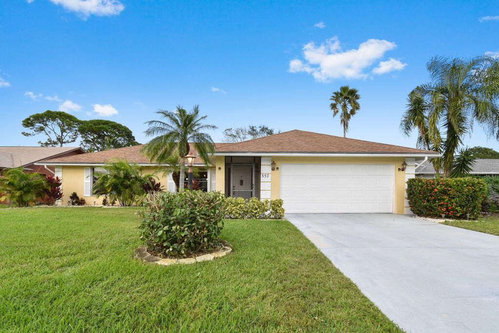 Photo of 357 NE Gulfstream Avenue, Port Saint Lucie, FL 34983 (MLS # R10780654)