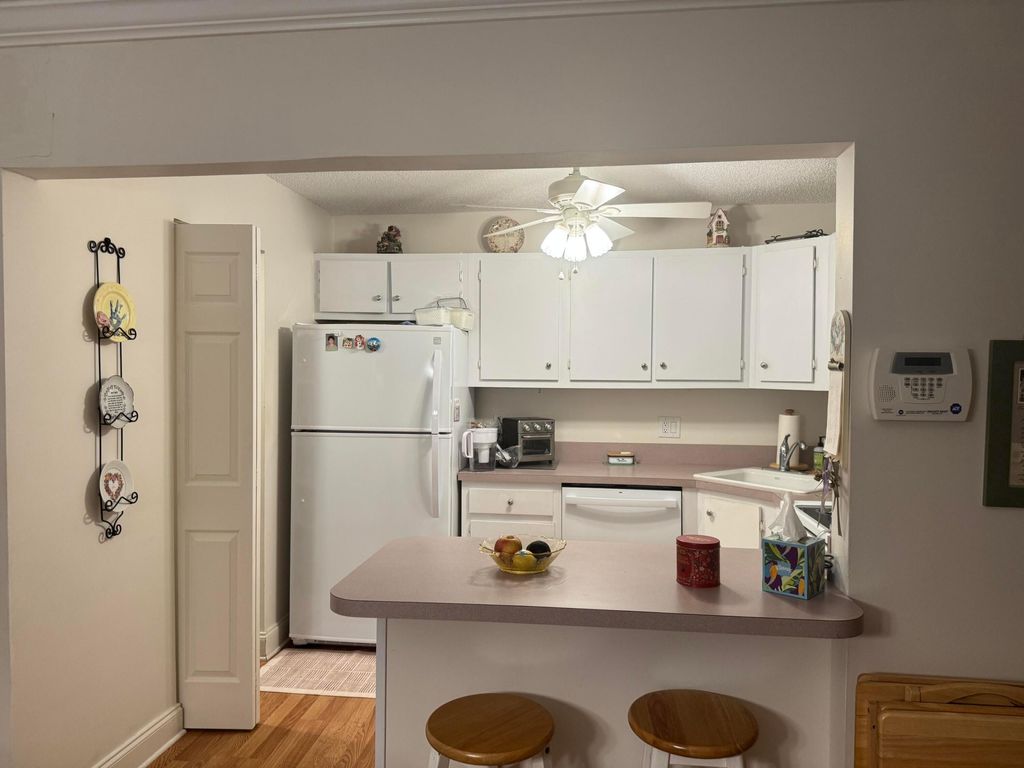 Photo of 417 Pine Glen Lane #C-2, Greenacres, FL 33463 (MLS # B26029512)