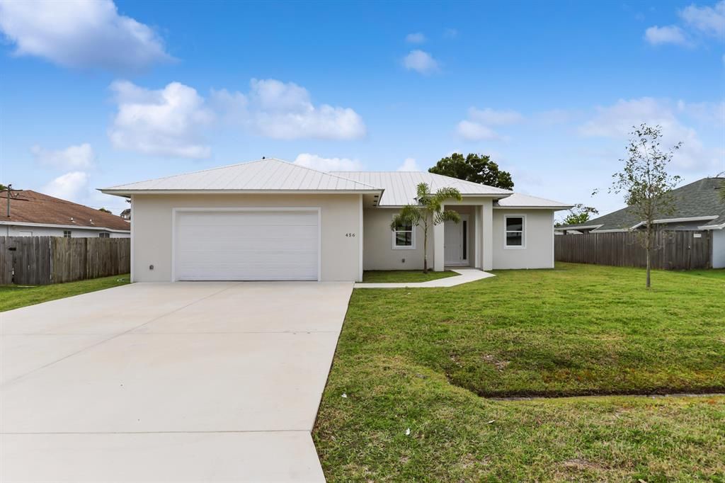 Photo of 456 SE Skipper Lane, Port St Lucie, FL 34983 (MLS # R10886660)