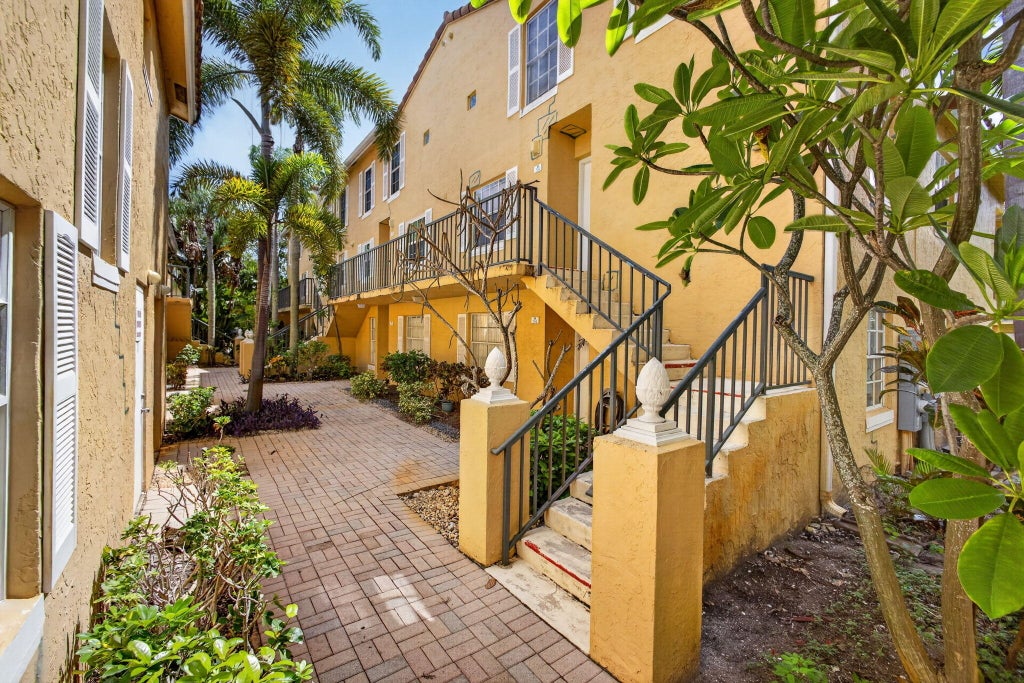 Photo of 1120 Lake Shore Drive #Unit 204, Lake Park, FL 33403 (MLS # B26083214)