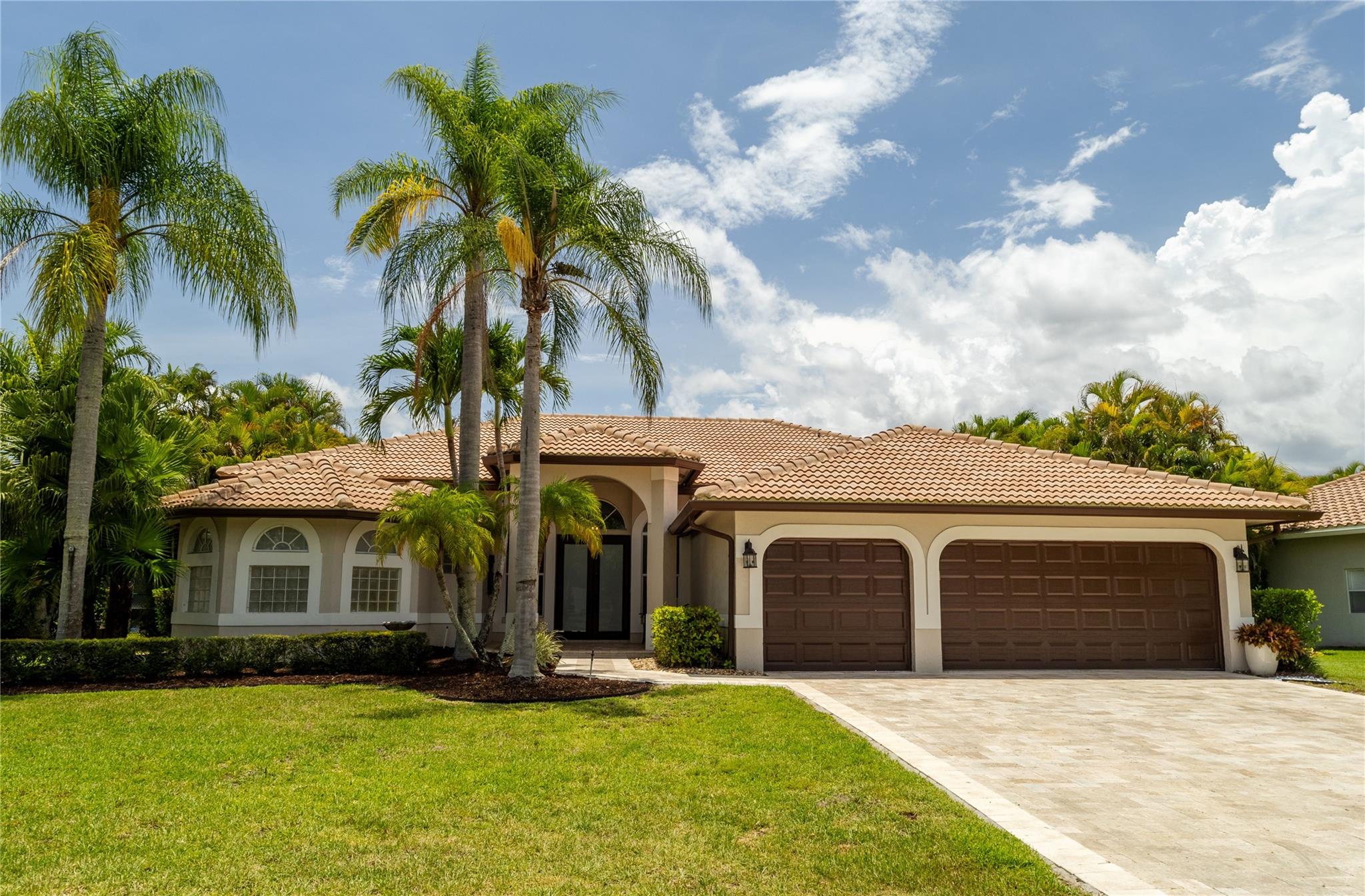 Renovated 6BR/4BA pool home in sought-after Kensington Glen. Over 3,000 SF on .25 acre+ lot. Move-in ready w/ marble floors, open layout & modern kitchen perfect for entertaining. Primary suite has 2 walk-in closets, spa bath w/ 2-person jacuzzi, waterfall shower & private WC. Two add’l BRs have ensuite baths & walk-ins ideal for guests or multi-gen living. Freshly painted in/out. Resort-style saltwater pool w/ waterfall, travertine deck, mature palms. 2019 roof w/ seamless gutters & 2 Rheem 3T A/Cs in 2020. Zoned for top-rated schools incl. Marjory Stoneman Douglas High. Low HOA & lower taxes than Parkland.