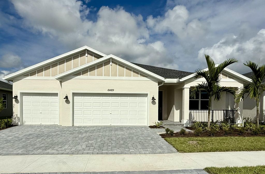 Photo of 6489 NW Cloverdale Avenue, Port Saint Lucie, FL 34987 (MLS # B26032123)