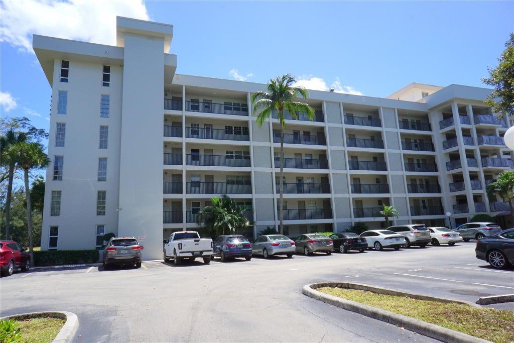 Photo of 2600 S COURSE Drive #410, Pompano Beach, FL 33069 (MLS # B26057902)