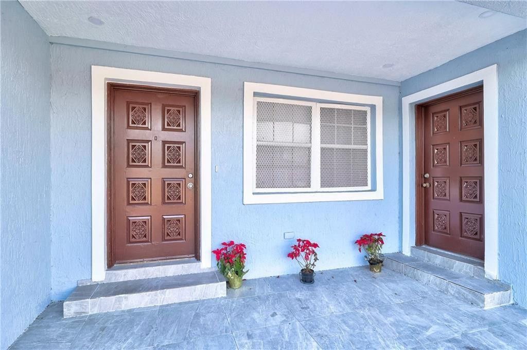 Photo of 1389 W 33rd Street, Riviera Beach, FL 33404 (MLS # F10545537)