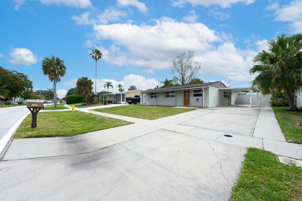 Photo of 3654 Florida Boulevard, Palm Beach Gardens, FL 33410 (MLS # R11082634)