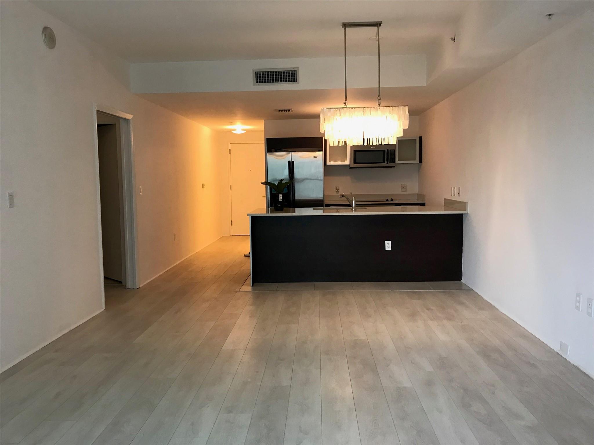 Remodeled 1/1.5 spacious apartment in Edgewater for a GREAT PRICE!! BEAUTIFUL. NEW wood floors. Balcony faces east. MODERN HIGH TECH BUILDING, EUROPEAN KITCHEN, 9 FT CEILINGS, 2 POOLS, LAVISH SPA, THEATER ROOM, ACROSS FROM PARK, DOWNTOWN, NEAR MARINA, MIAMI HEAT ARENA, AND SOUTH BEACH. Rent includes basic cable and internet Easy to show