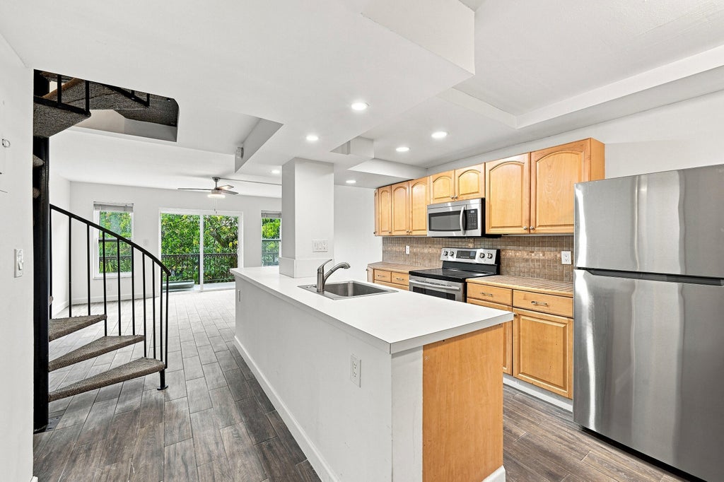Photo of 640 TENNIS CLUB Drive #307, Fort Lauderdale, FL 33311 (MLS # B26065165)