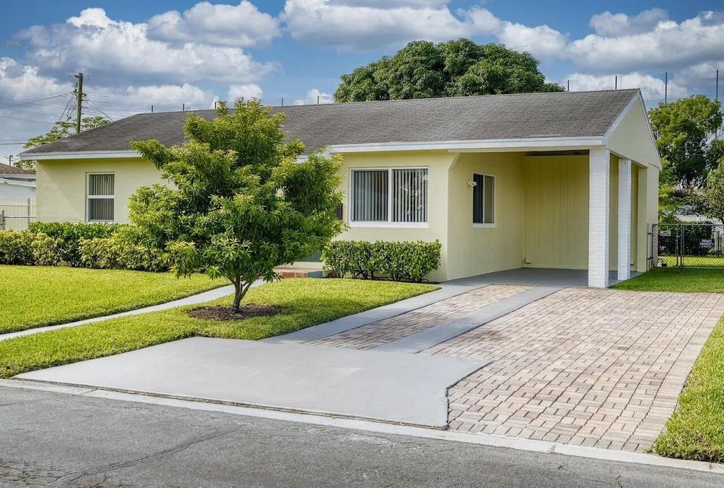 Photo of 906 Lytle Street, West Palm Beach, FL 33405 (MLS # R11123824)