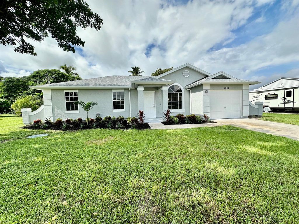 Photo of 1858 SE Balleto Street, Port St Lucie, FL 34952 (MLS # R10927497)