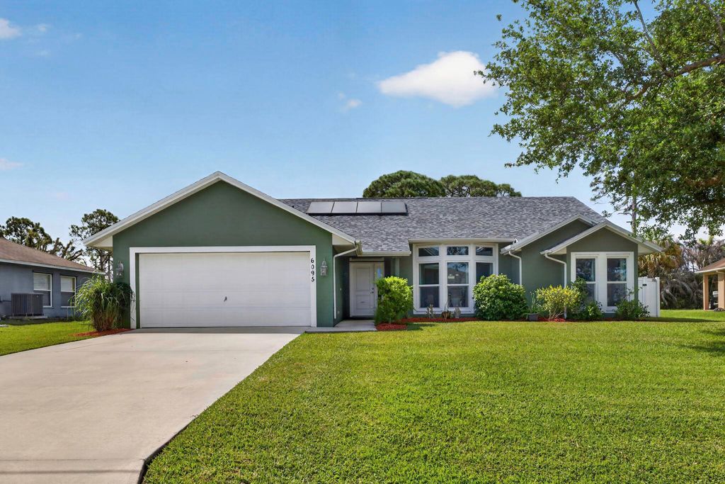Photo of 6095 NW East Deville Circle, Port Saint Lucie, FL 34986 (MLS # B26014599)