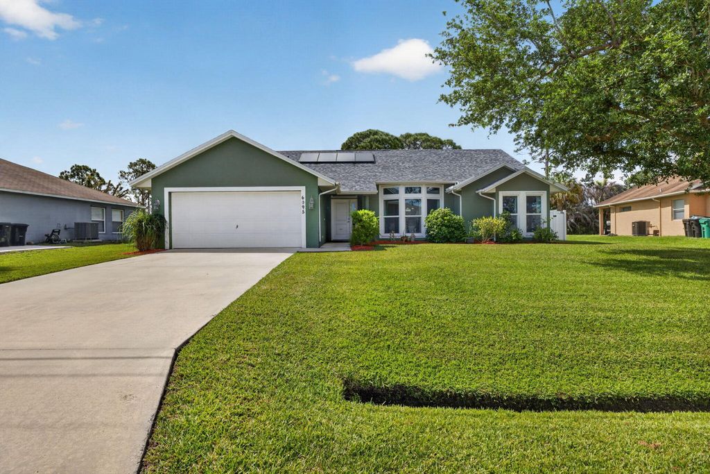 Photo of 6095 NW East Deville Circle, Port Saint Lucie, FL 34986 (MLS # B26014599)