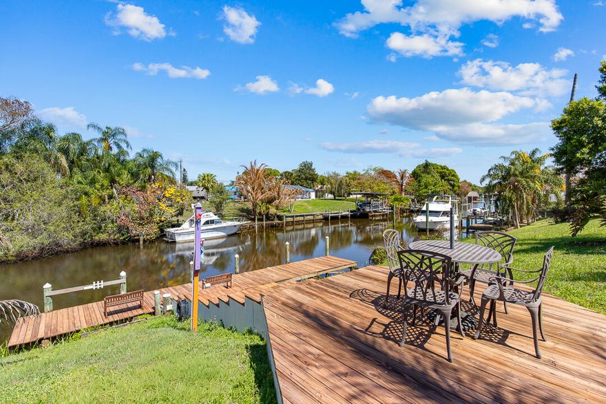 Live the Florida waterfront lifestyle in this updated coastal ranch-style waterfront 4BR/3BA home with pool and 95ft canal frontage, quick access to the ocean. Enjoy a screened in pool, updated features including a 2022 roof and new pool heater & equipment (2025-2026), and a relaxed coastal feel throughout. Extra separate 1BR/1BA suite with private entrance-perfect for guests, in laws or rental income. 2024 Leased Solar Panel System, offering energy efficiency, lower utility costs, and a more environmentally conscious lifestyle. Conveniently located near beaches, restaurants, and shopping in Port St. Lucie.