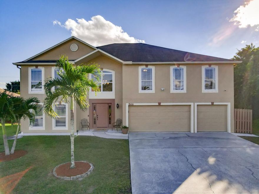 Majestic 2-story CBS home with square footage galore!  Enjoy this home with 6 large bedrooms, 4 full baths, a half bath, and 3-car garage means plenty of room to breathe and expanded concrete driveway with lots of unique upgrades.  Open floor plan with high ceilings, high hat lighting, living room with bar, dining room and kitchen overlooking the great outdoor space.   Prepare an elaborate dinner for family & friends in this well equipped large gourmet kitchen features stainless steel appliances, new faucet and granite countertop.  On 1st Floor, we have one Master Bedroom/Bathroom Suite with large walk-in closet.  The 2nd Floor provide an additional oversize second Master Bedroom/Bathroom Suite with 2 spacious walk-in closets and 2 standard closets. Master Bathroom complete with dual vanities, a shower, and separate soaking tub. The 4 other Bedrooms with Jack & Jill Bathroom setup and walk-in closets.  All bathrooms furnished with new faucets and newly installed upgraded cabinet in 1/2 bathroom.   Large closets throughout the home. Interior and exterior professional painted with Sherwin Williams, walls, ceiling, builder-grade 5-1/4 baseboards and doors.  Floors with luxury waterproof vinyl and premium eco-friendly underlayment, stained hardwood stairway, and ceramic tiles awaiting its new owner.  Upgraded light fixtures and window dressing blinds throughout. Fairly new Air conditioner units including air handlers and Water heater.  The laundry room is located 1st floor with closet and sink cabinet.   Entry has a solid door with double sidelights.  

Outdoor entertainment at its finest for your entire family with aluminum-framed covered grill canopy back porch, beautiful manicured landscape front and back surrounded with adult palm trees, and an extra storage utility shed in the backyard.  Recently installed guttering on roof.  Security system for this home features, cameras in front yard and interior entry, Ring security system with motion detection, floodlights on front driveway and backyard; plus two-way communication Ring video doorbell on front door with security sensors on external entry doors and first-floor windows.  Energy-efficient home and so much more!  Close to shopping center, restaurants & parks.  Don't miss out on owning this almost 4,000 square feet piece of paradise of Florida living, move-in ready!  Must see!