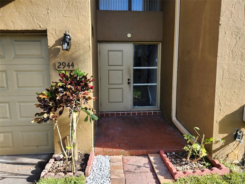 Photo of 2944 E Missionwood Ln #48-D, Miramar, FL 33025 (MLS # F10506467)