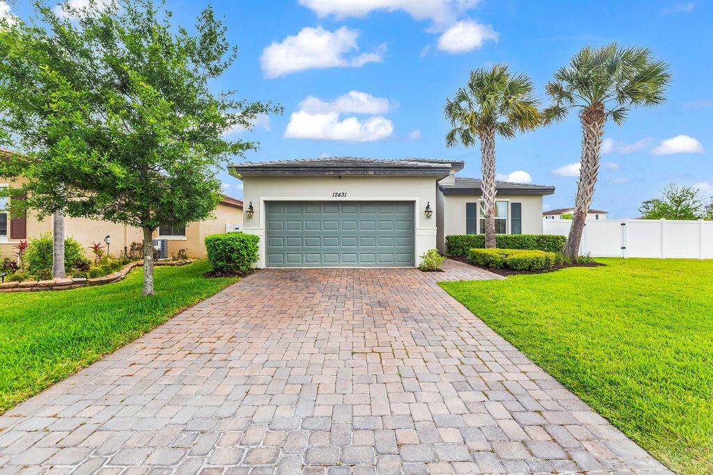 Photo of 12431 NW Stanis Lane, Port Saint Lucie, FL 34987 (MLS # B26018639)