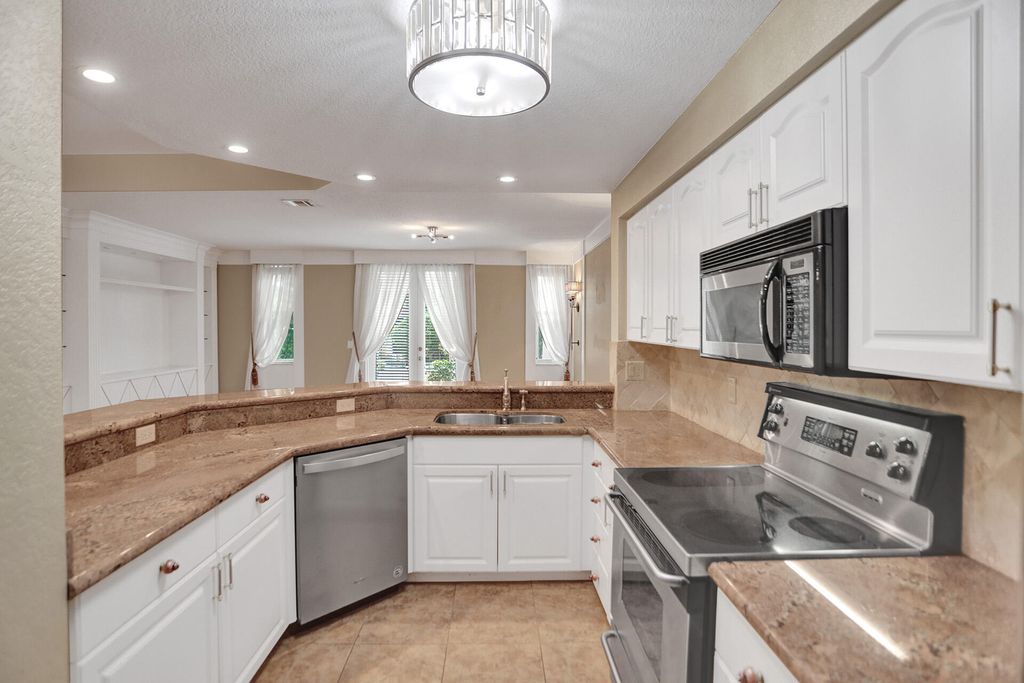 Photo of 1900 Oceanwalk Lane #115, Pompano Beach, FL 33062 (MLS # B26008370)