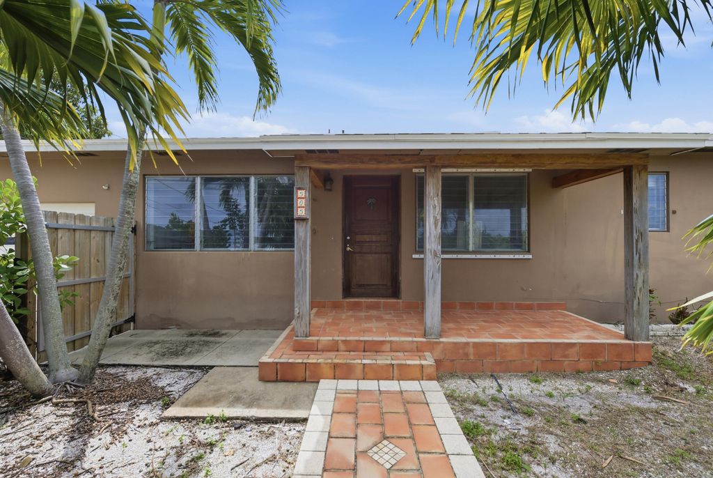 Photo of 303 Cornell Drive, Lake Worth Beach, FL 33460 (MLS # B26019621)
