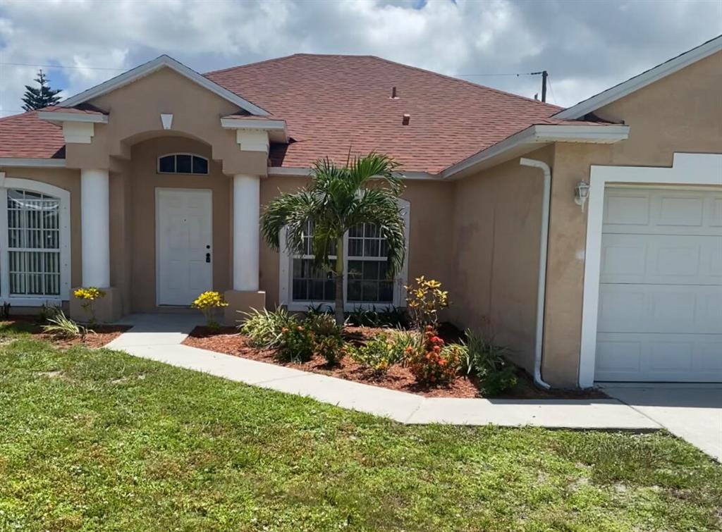 Photo of 180 SW Ladybug Drive, Port Saint Lucie, FL 34953 (MLS # R10813554)