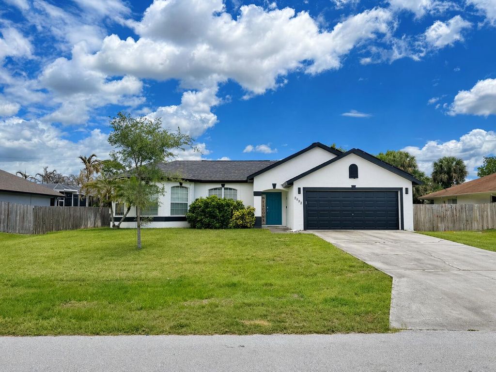 Photo of 2592 SW National Circle, Port Saint Lucie, FL 34953 (MLS # B26019216)