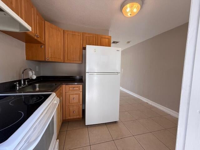Photo of 400 Metcalf Court, West Palm Beach, FL 33407 (MLS # B26077538)