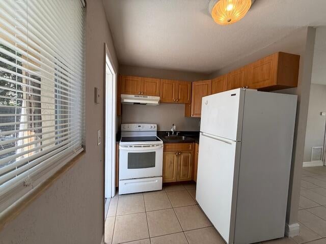 Photo of 400 Metcalf Court, West Palm Beach, FL 33407 (MLS # B26077538)